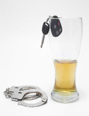 Glass of beer, car keys,  and handcuffs