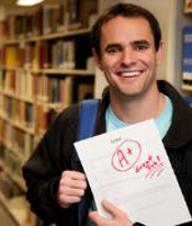 Man holding an A+ paper