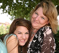 Mother hugging her teen